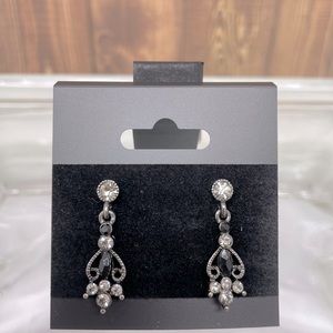 Elegant black and cubic zirconia dangle earrings with a post backing.